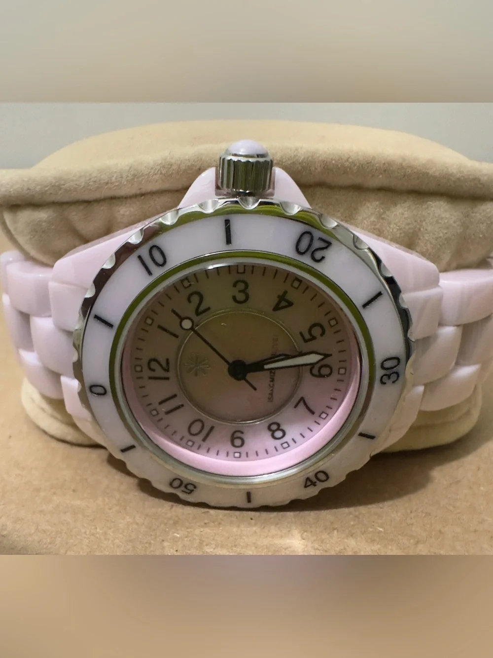 LIKE NEW Isaac Mizrahi Women’s Pink Ceramic-Style Round Face Watch.